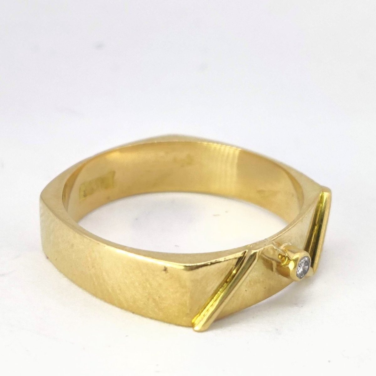 Bague géométrique en or jaune et diamant - Castafiore