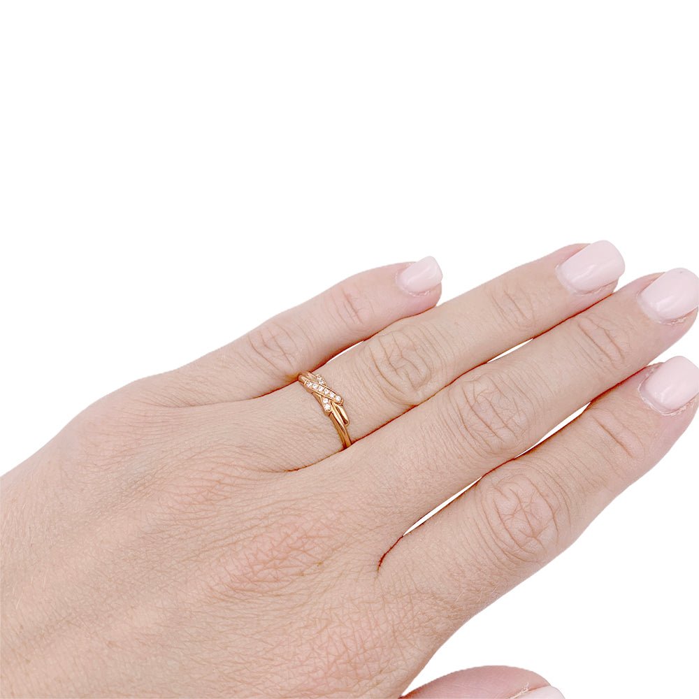 Bague "Jeux de Liens" CHAUMET en or rose et diamants. - Castafiore