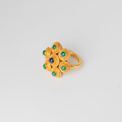 Bague Lalaounis en or jaune et cabochons d'émeraudes et d'un saphir - Castafiore