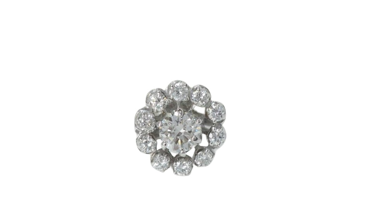 Bague marguerite en or blanc et diamants - Castafiore