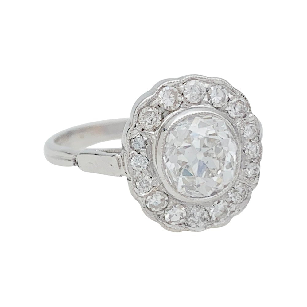 Bague marguerite en or blanc et diamants - Castafiore