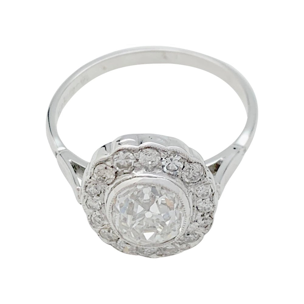 Bague marguerite en or blanc et diamants - Castafiore
