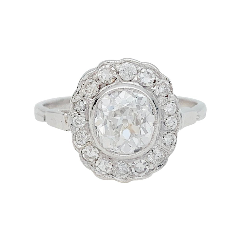 Bague marguerite en or blanc et diamants - Castafiore