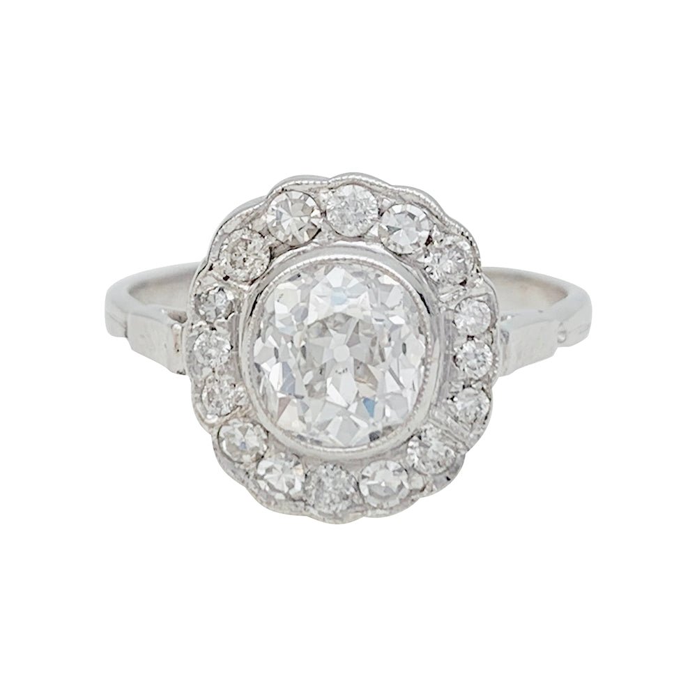Bague marguerite en or blanc et diamants - Castafiore