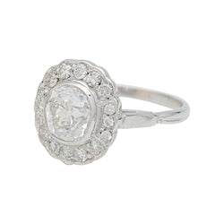 Bague marguerite en or blanc et diamants - Castafiore