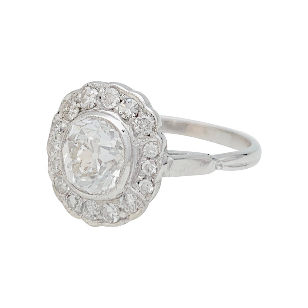 Bague marguerite en or blanc et diamants - Castafiore