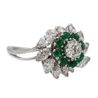 Bague Marguerite en or blanc, platine, émeraudes et diamants - Castafiore