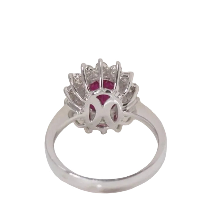 Bague marguerite en or blanc, rubis et diamants - Castafiore