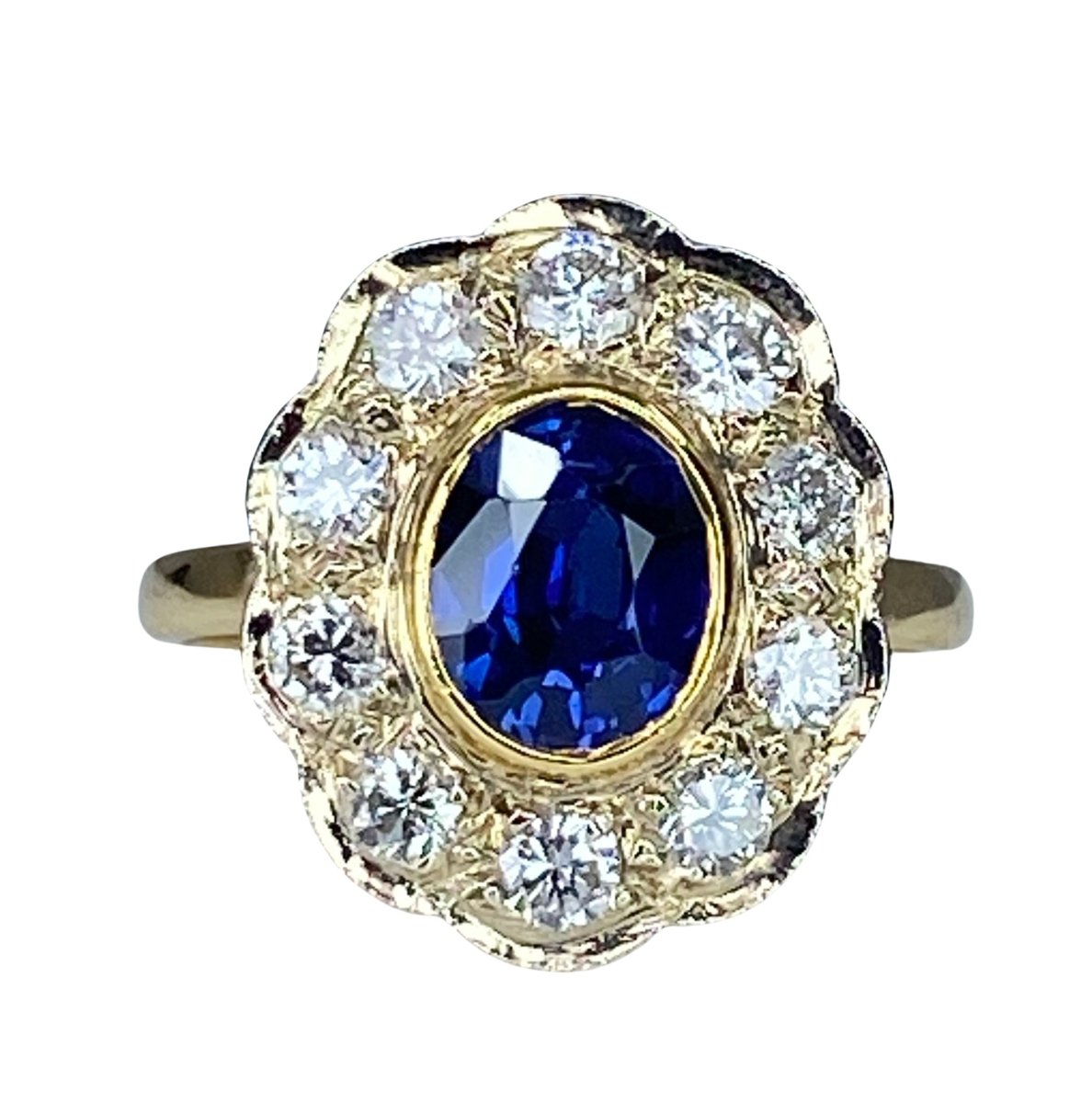 Bague Marguerite en or jaune, saphir et diamants - Castafiore