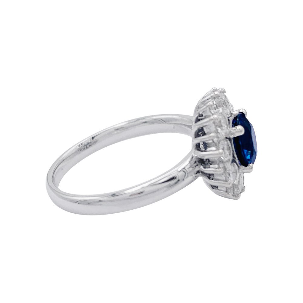 Bague marguerite saphir entourage diamants - Castafiore