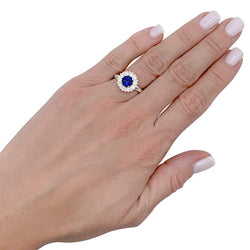 Bague marguerite saphir entourage diamants - Castafiore