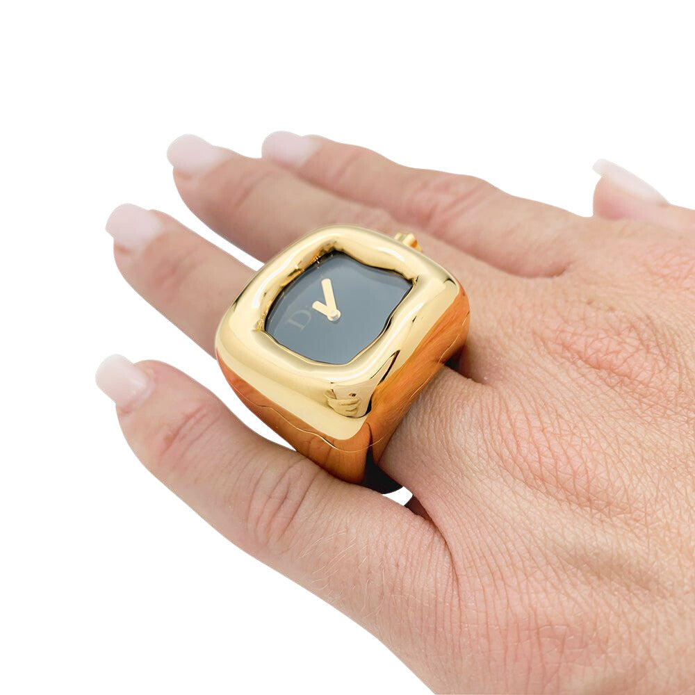 Bague montre Dior, modèle "Nougat", en or jaune et onyx - Castafiore