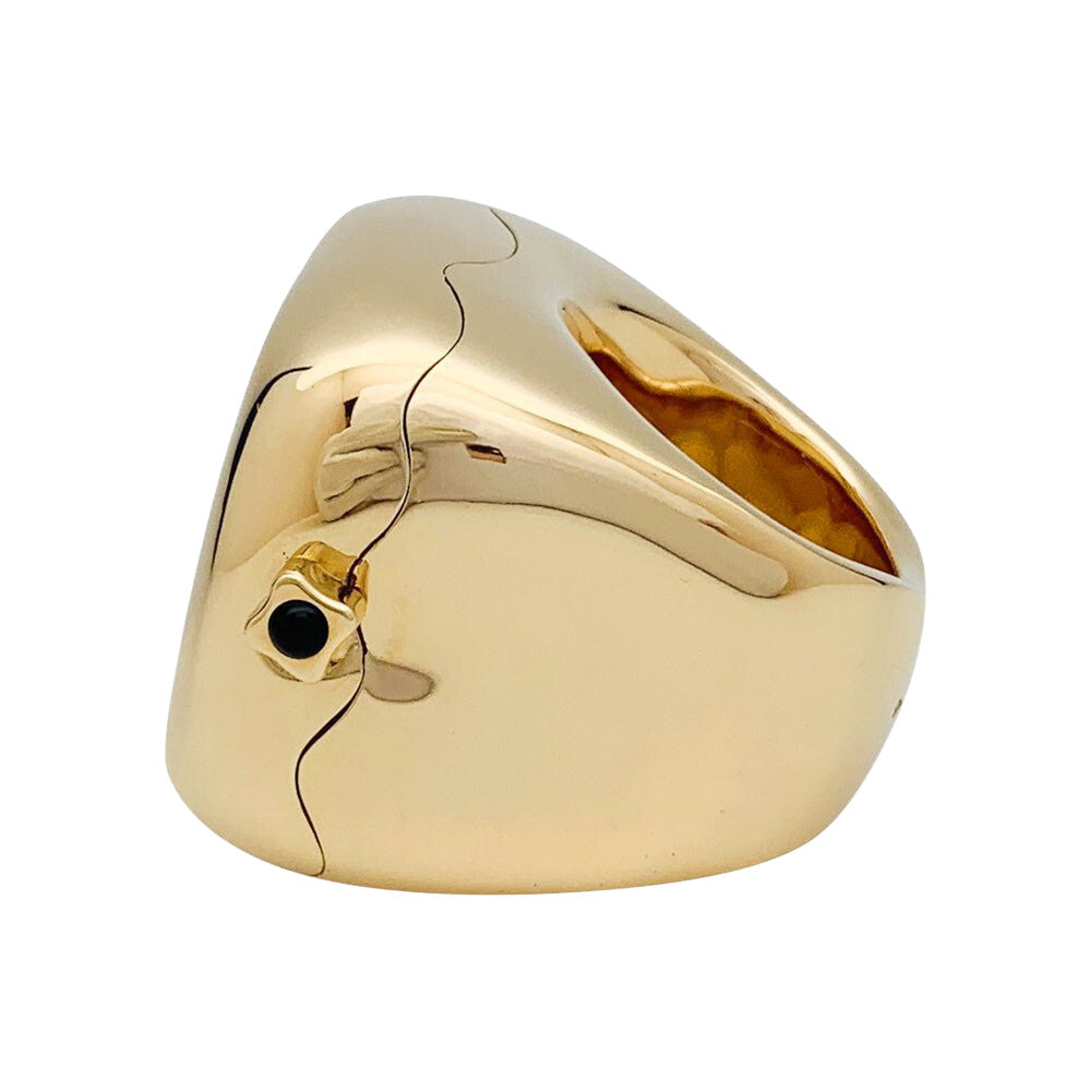 Bague montre Dior, modèle "Nougat", en or jaune et onyx - Castafiore