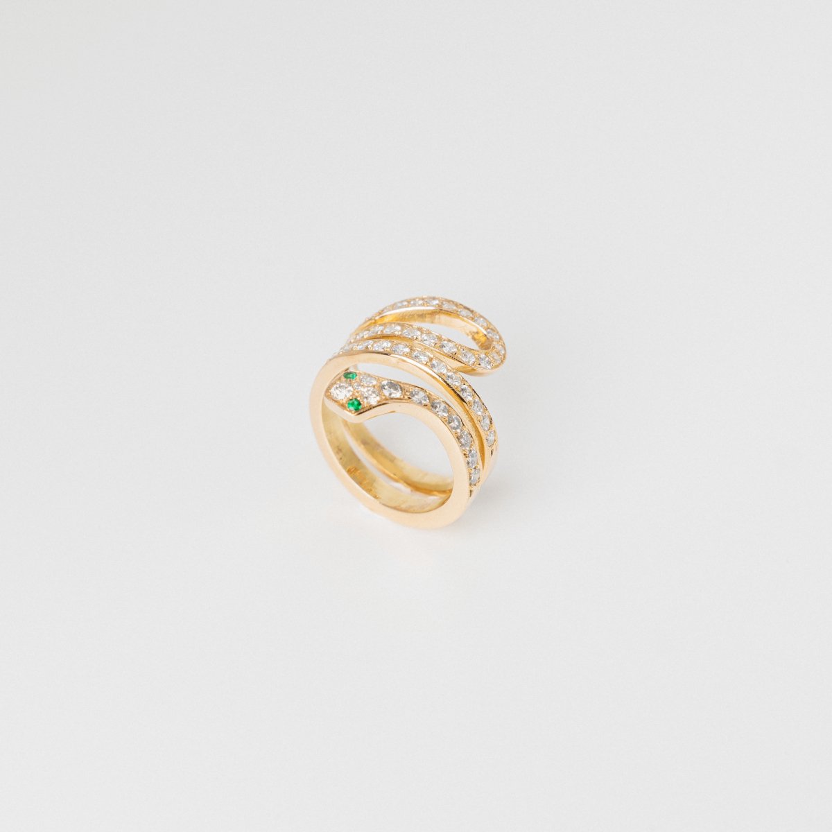 Bague Serpent en or jaune, diamants et émeraudes - Castafiore