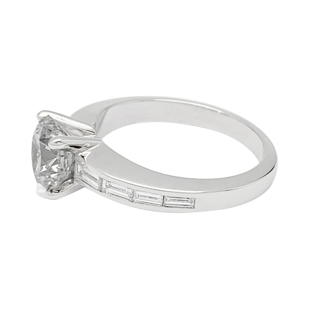Bague solitaire accompagné diamants baguette - Castafiore