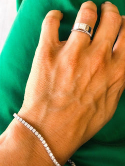 Bague solitaire en or gris ornée d'un diamant taille princesse - Castafiore