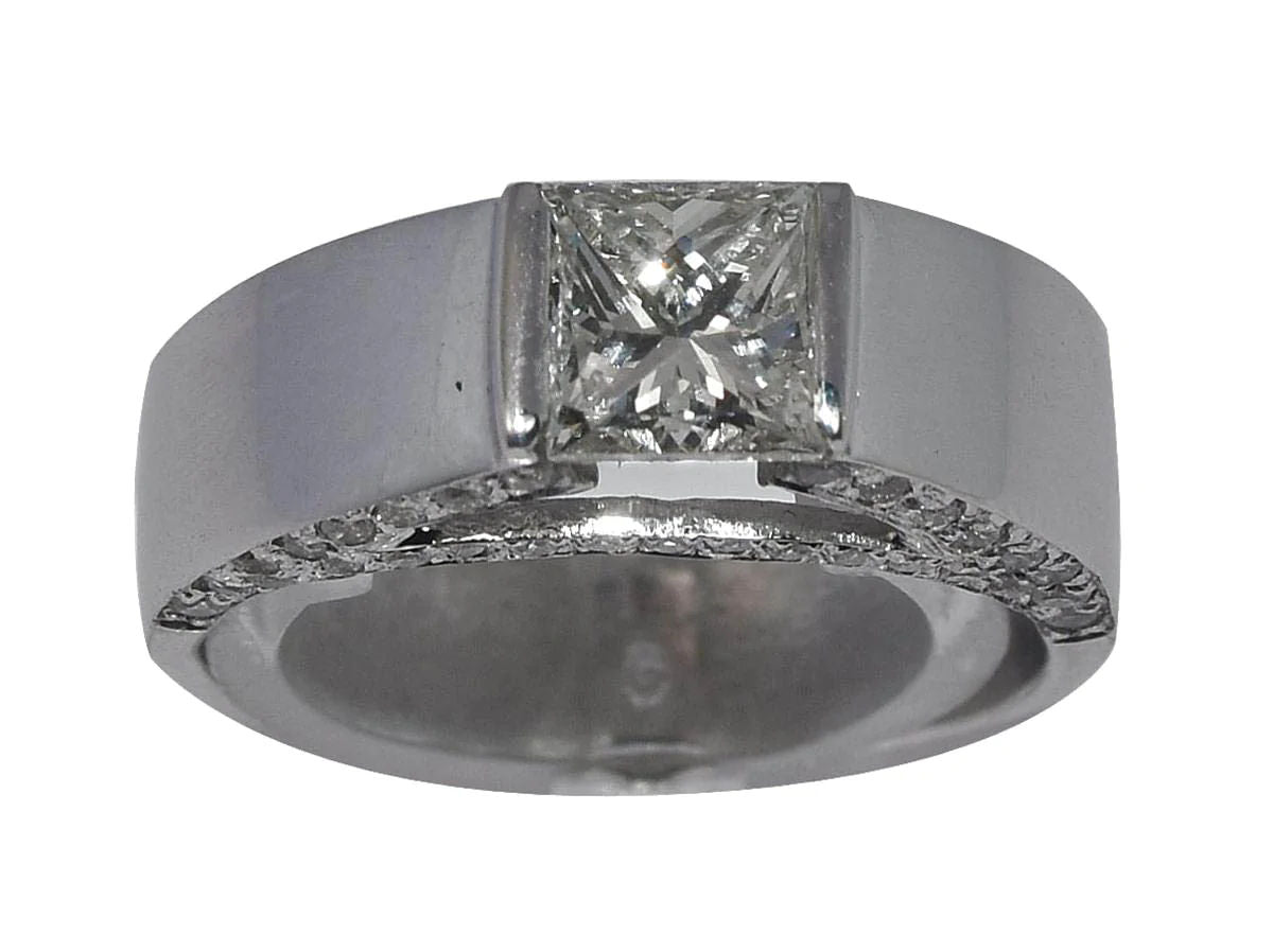 Bague solitaire en or gris ornée d'un diamant taille princesse - Castafiore