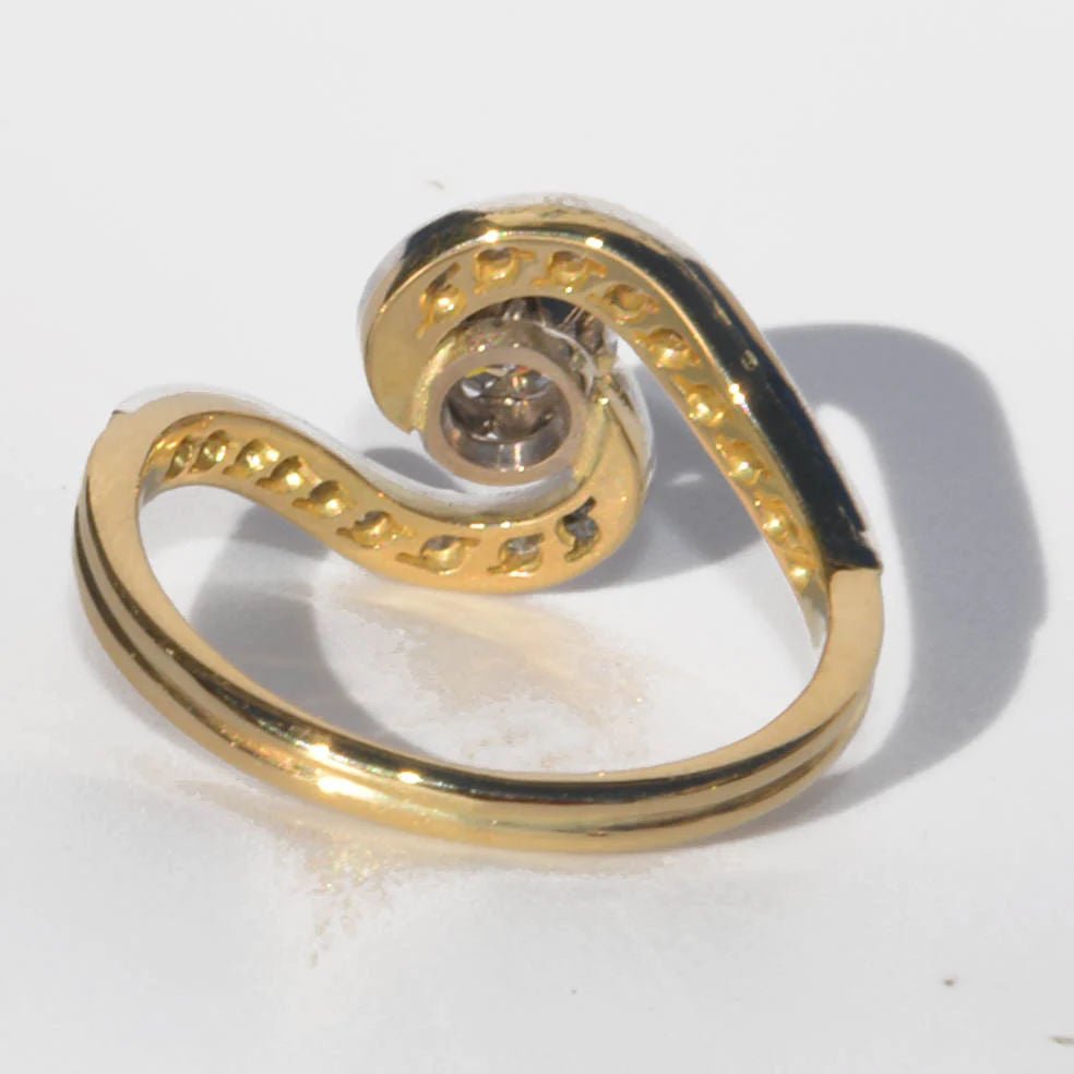 Bague tourbillon en or jaune et platine et diamants - Castafiore