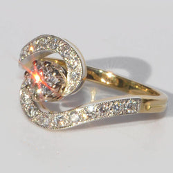 Bague tourbillon en or jaune et platine et diamants - Castafiore