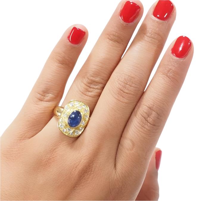 Bague vintage en or jaune,cabochon de saphir et diamants - Castafiore