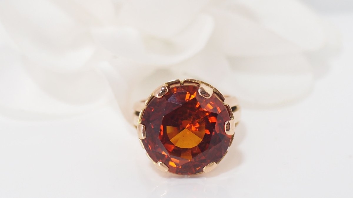 Bague vintage en or rose et saphir orange - Castafiore