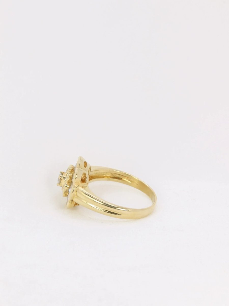 Bague vintage fleur en or et diamants baguette - Castafiore