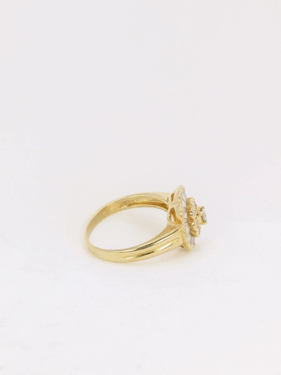 Bague vintage fleur en or et diamants baguette - Castafiore