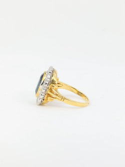 Bague vintage marguerite en or, saphir et diamants - Castafiore