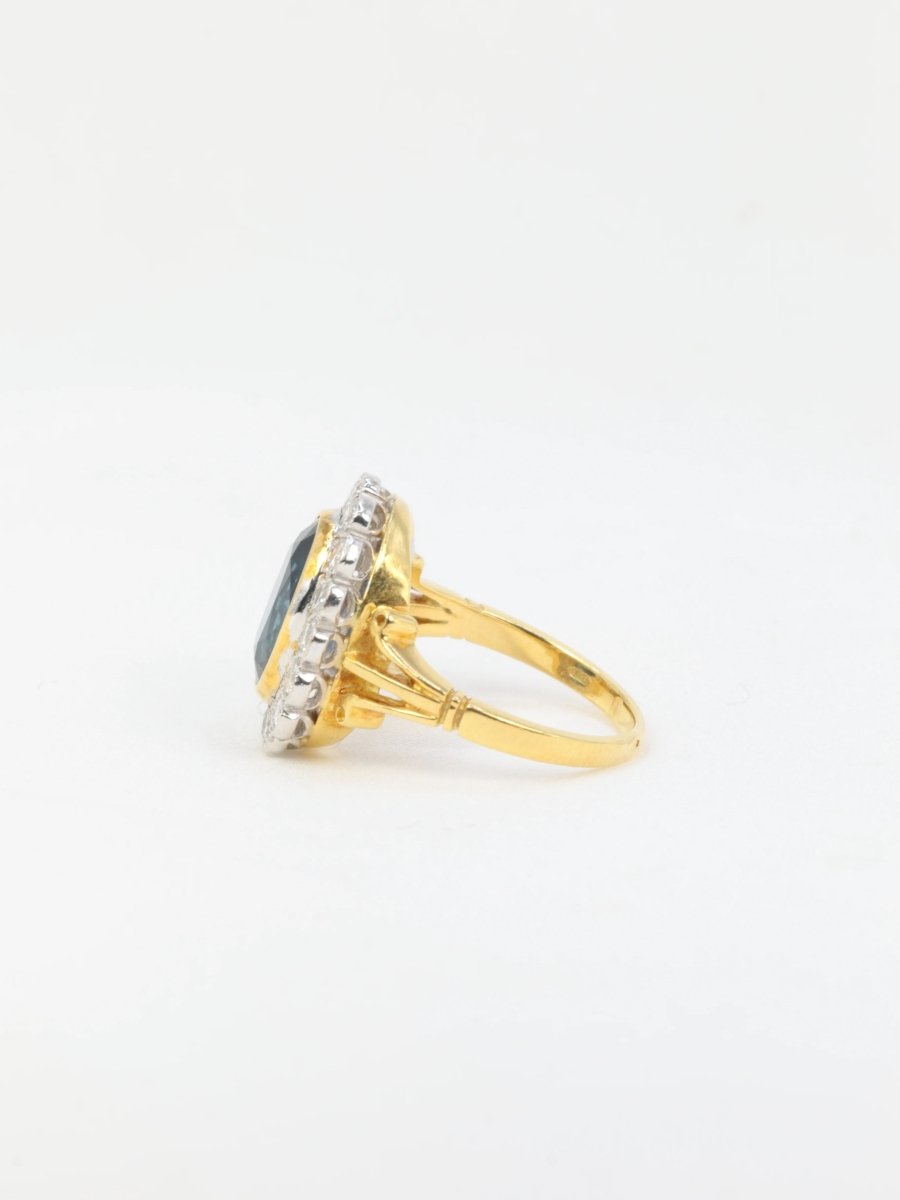 Bague vintage marguerite en or, saphir et diamants - Castafiore
