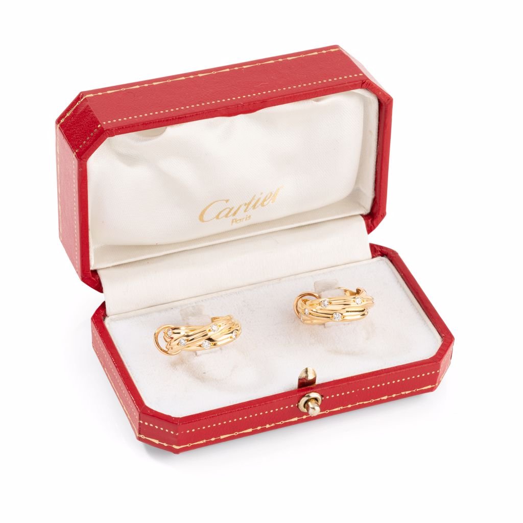 Boucles d'oreilles CARTIER, "collection trinity stars" en or jaune - Castafiore