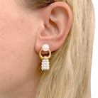 Boucles d'oreilles Cartier, "Pompons", or jaune, perles. - Castafiore