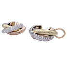 Boucles d'oreilles Cartier, "Trinity", 3 ors, diamants. - Castafiore