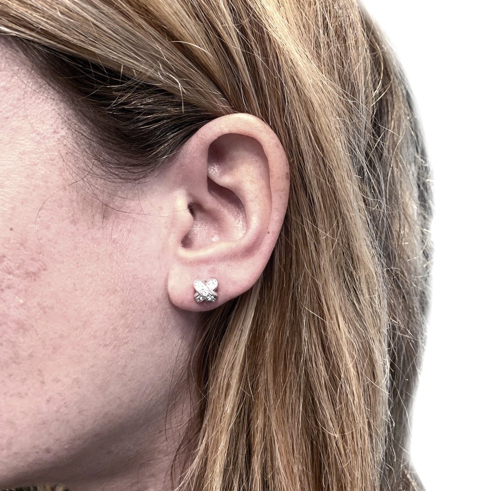 Boucles d'oreilles Chaumet, "Liens", or blanc et diamants - Castafiore