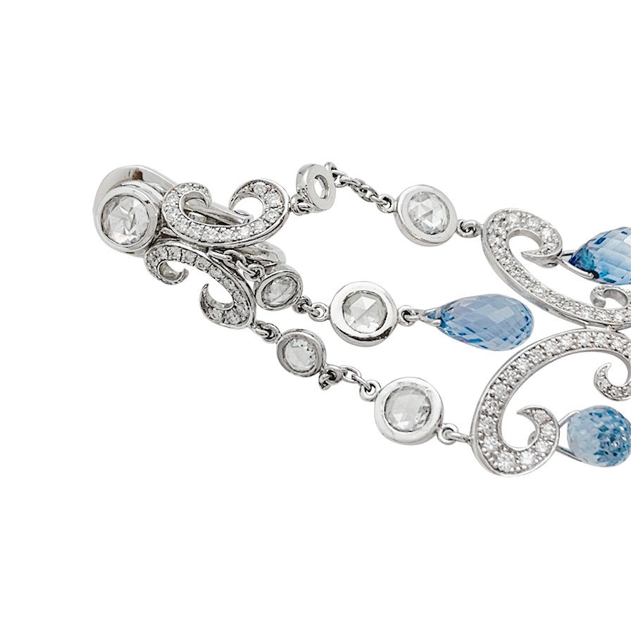 Boucles d'oreilles CHOPARD "Copacabana" en or blanc, diamants, saphirs - Castafiore