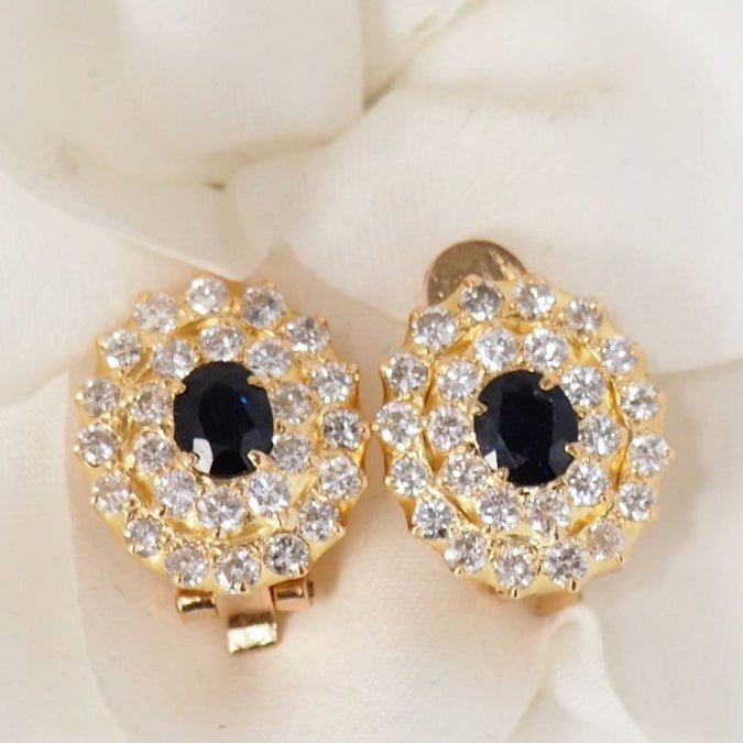 Boucles d'oreilles double entourage en or jaune, saphirs et diamants - Castafiore