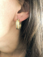Boucles d'oreilles or jaune et diamant de la maison Cartier modèle Trinity - Castafiore