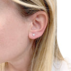 Boucles d'oreilles Puces TIFFANY & CO. en platine et diamants - Castafiore