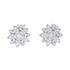 Boucles d'oreilles VAN CLEEF & ARPELS "Lotus" or blanc, diamants - Castafiore