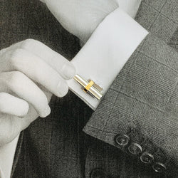 Boutons de manchette CARTIER en or jaune, acier et onyx - Castafiore