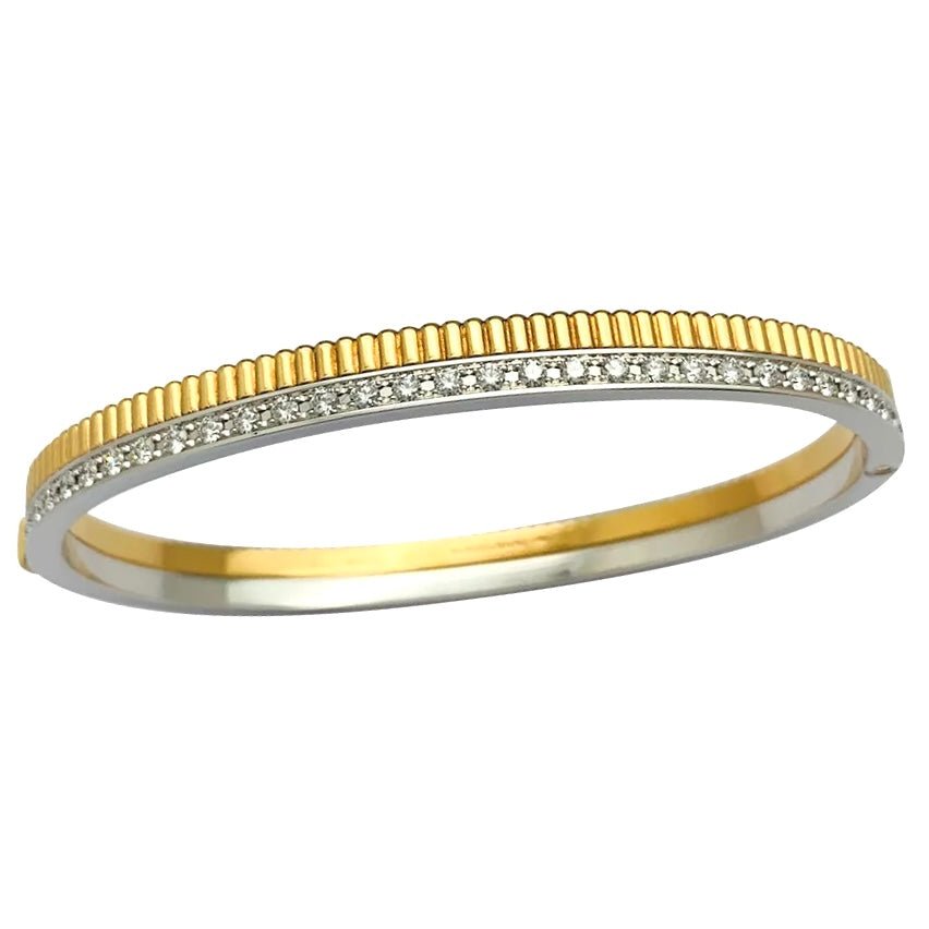 Bracelet Boucheron, "Quatre Radiant" , en or jaune, blanc et diamants - Castafiore