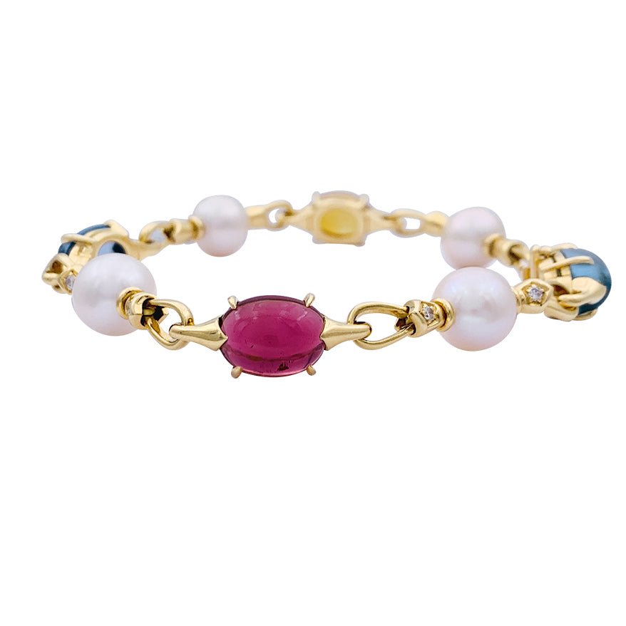 Bracelet Bulgari en or jaune, perles, pierres de couleur. - Castafiore