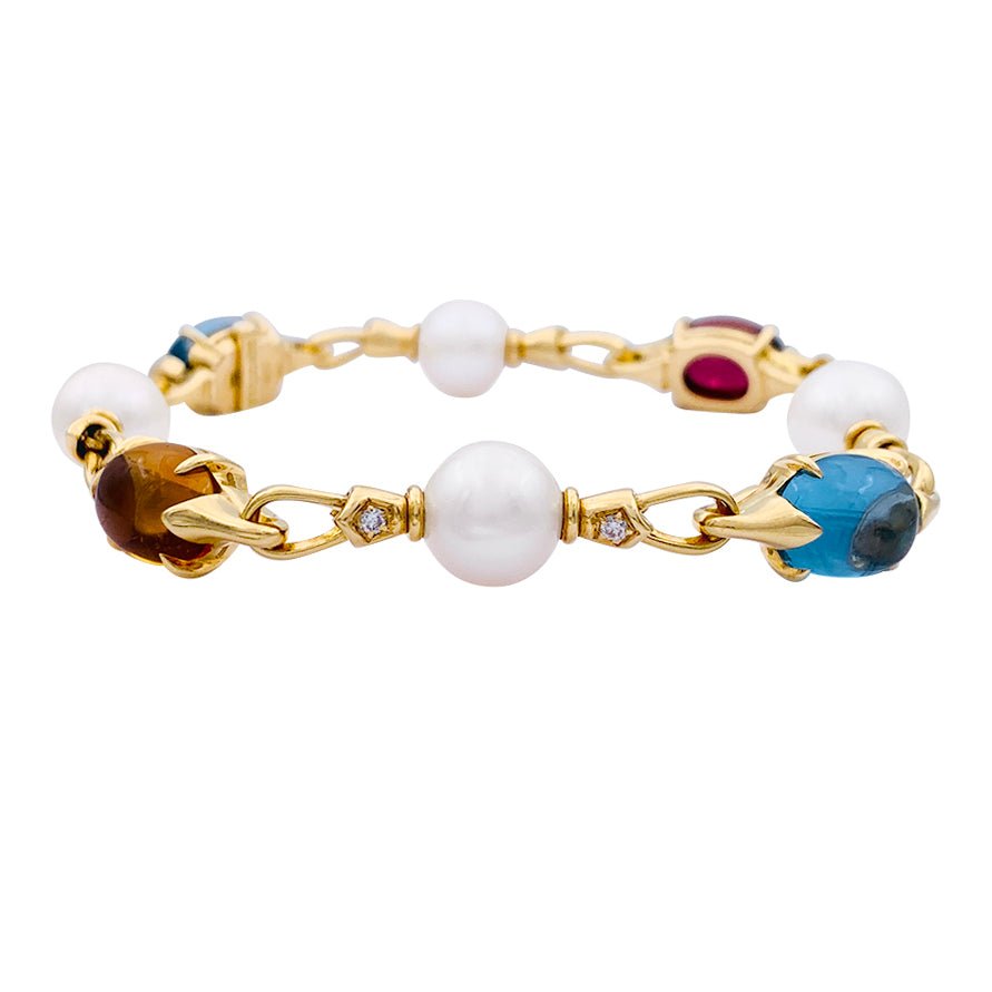 Bracelet Bulgari en or jaune, perles, pierres de couleur. - Castafiore