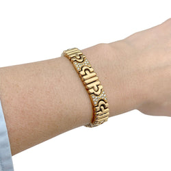 Bracelet Bulgari, "Parentesi", or jaune, diamants - Castafiore