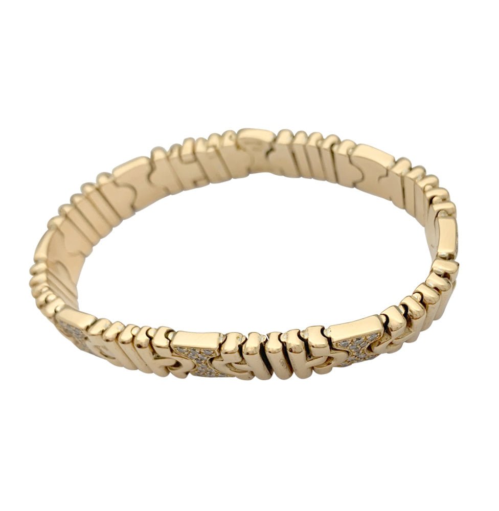 Bracelet Bulgari, "Parentesi", or jaune, diamants - Castafiore