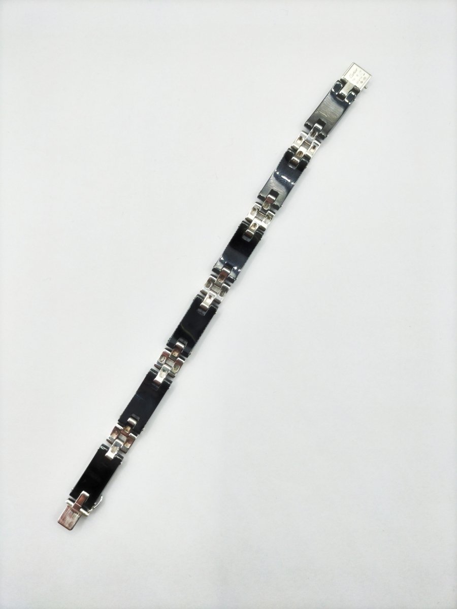 Bracelet CARTIER "panthère" en or blanc, diamants et céramique noire - Castafiore