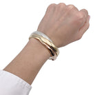 Bracelet Cartier, "Trinity", 3 tons d'or - Castafiore