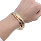 Bracelet Cartier, "Trinity", 3 tons d'or - Castafiore