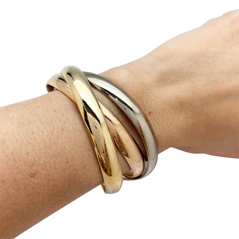 Bracelet Cartier, "Trinity", 3 tons d'or - Castafiore