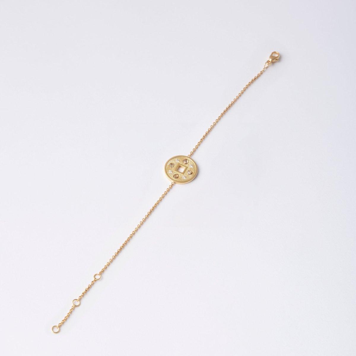 Bracelet DE BEERS "Talisman", en or jaune et diamants - Castafiore