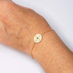 Bracelet DE BEERS "Talisman", en or jaune et diamants - Castafiore